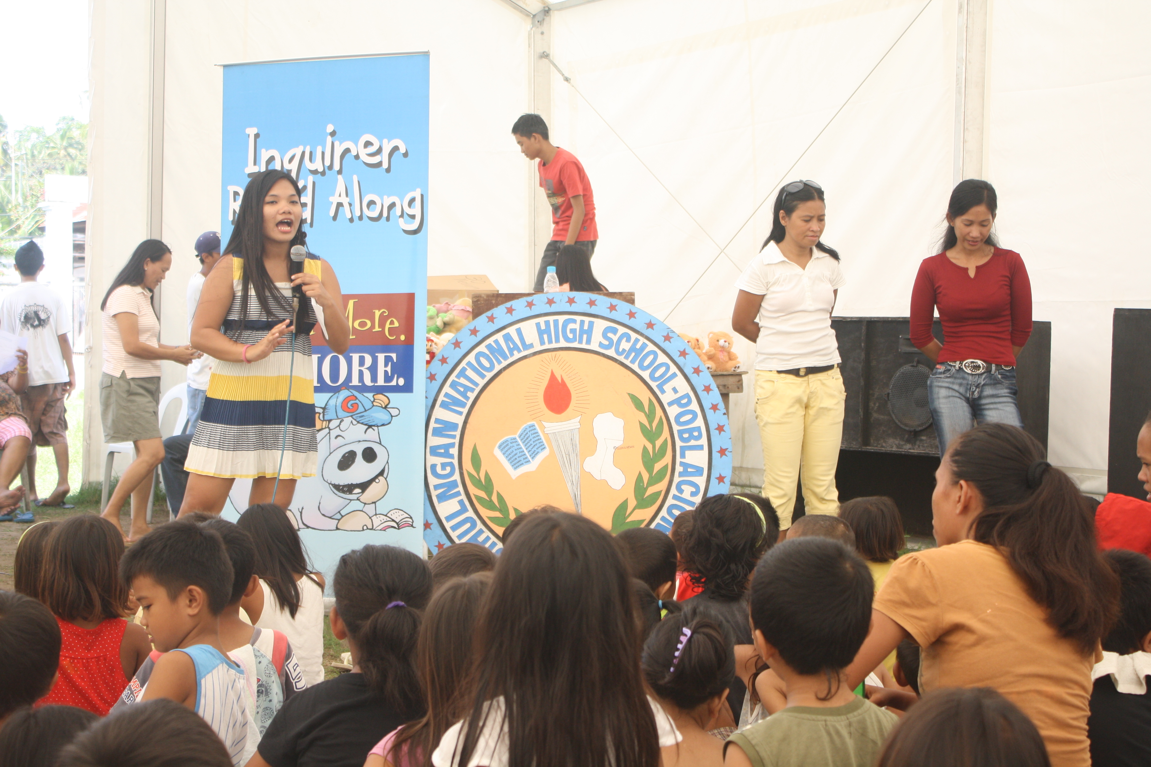 Philippine Daily Inquirer's Read-along Session with 200 children living in tents after a 6.9 magnitude earthquake shook Guihulngan, Negros Oriental on February 2012. 