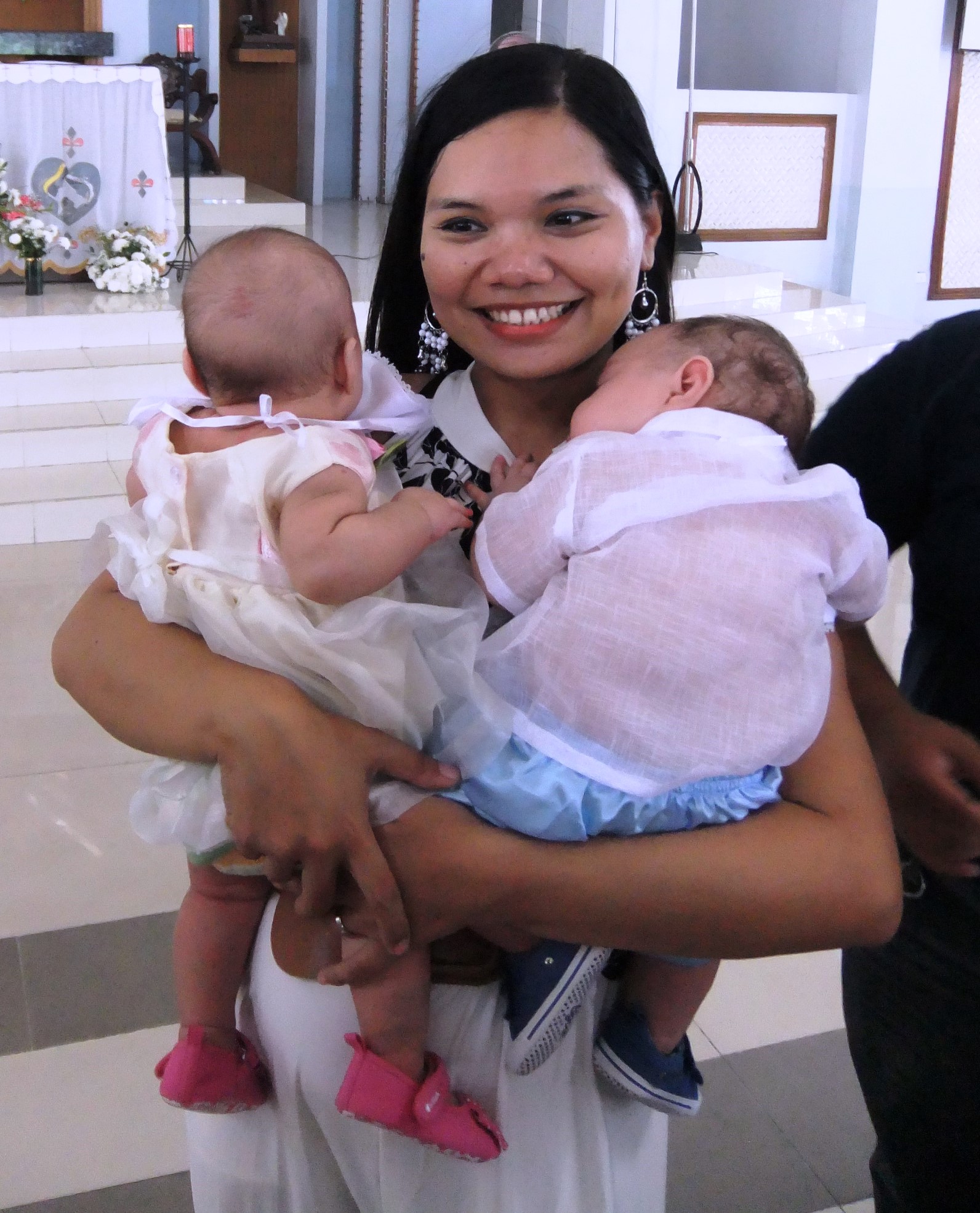 Nick and Toni during their baptism last September 29, 2013 at the Holy Family Parish. 