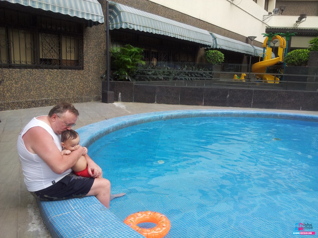 May 3. Father and son. Sweetest pool photo ever. 