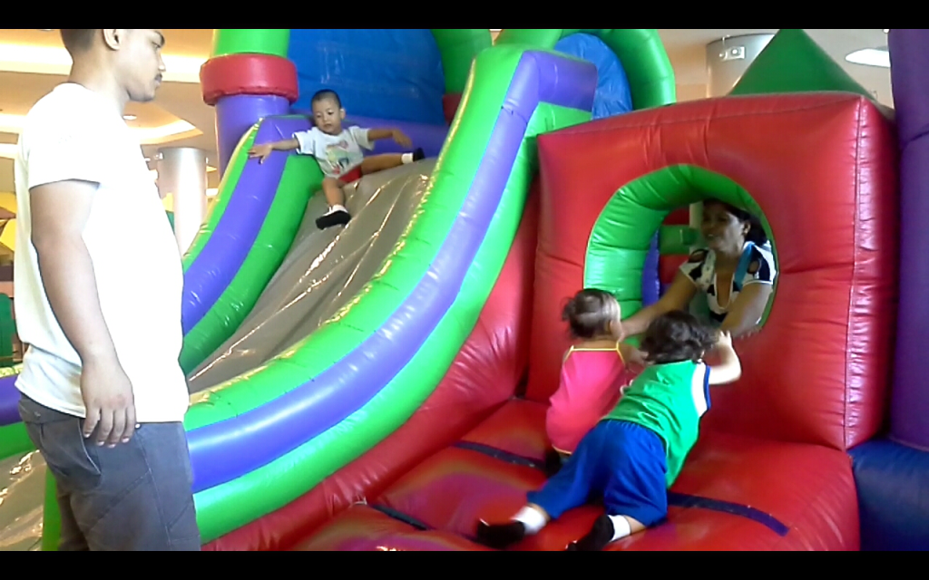 Their first bounce-and-slide experience at SM Consolacion in Cebu, Philippines.  